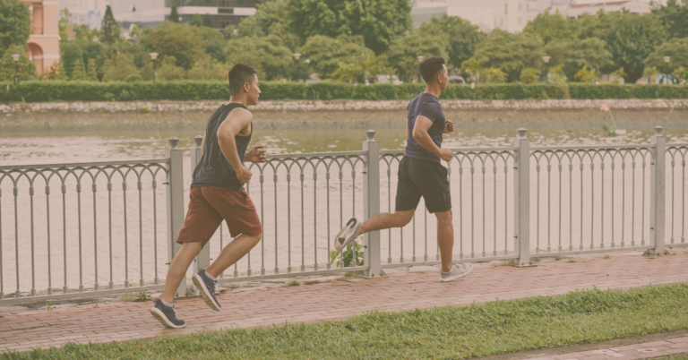 Two people jogging outdoors, symbolizing sustainable weight loss through active lifestyle